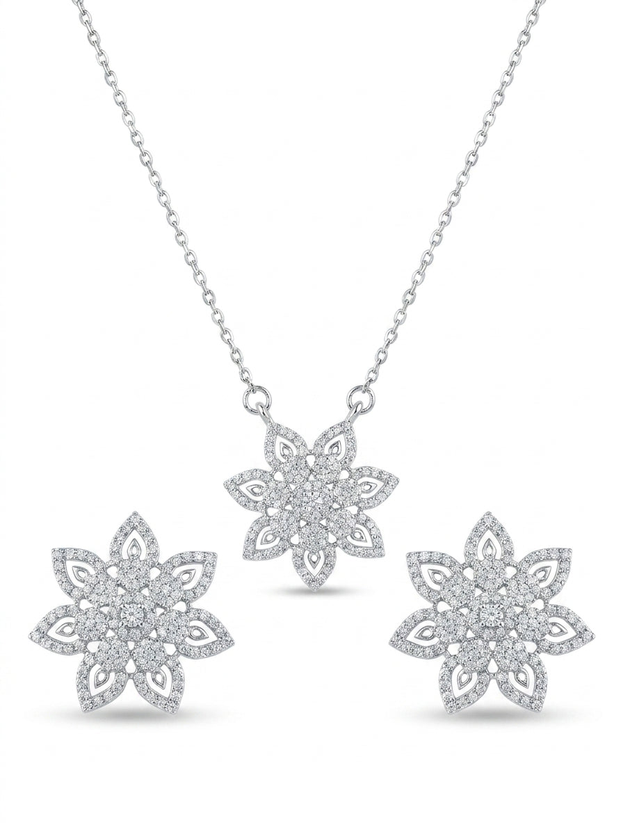 Floral Flower 925 sterling silver pendant necklace and stud earrings jewellery set with cubic zirconia by Silvme â€” styled view