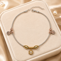 Styled view of the Silvme gold & rose-gold charm 925 sterling silver anklet for women