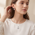 Silvme pure 925 sterling silver blossom flower pendant and stud earrings set with cubic zirconia, styled product image