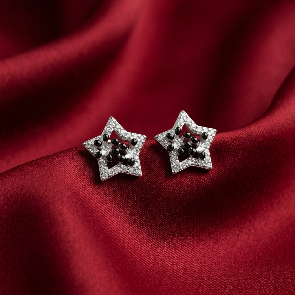 Black Star Stud Earrings, close-up detail