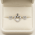 Silvme 925 silver dainty heart pendant and stud earrings with cubic zirconia, styled lifestyle image