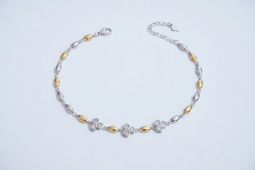 Detailed two-tone floral styling on the Silvme Two-Tone Floral CZ Bracelet in polished 925 silver