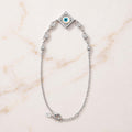 Charm, bead and chain detail on the Silvme rhombus CZ evil eye 925 silver anklet payal