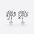 Bow & Star 925 silver stud earrings for women, gift for daughter, shown as a matching pair