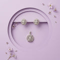 Silvme pure 925 sterling silver starburst medallion pendant and stud earrings set with cubic zirconia, side profile view