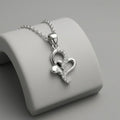 Detailed om pendant styling on the Silvme OM Pendant in polished 925 sterling silver, ideal for festive occasions