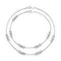 Silvme 925 sterling silver Cream Tube & Black Bead Evil Eye anklet, on a plain white background, full view