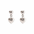 Double Puffed Heart Drop 925 silver drop stud earrings for women, gift for sister, shown as a matching pair