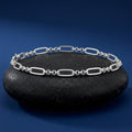 Link pattern and surface detail across the oval and bead link bracelet by Silvme