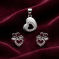 Open Heart 925 sterling silver pendant and stud earrings jewellery set with cubic zirconia by Silvme â€” angled studio view