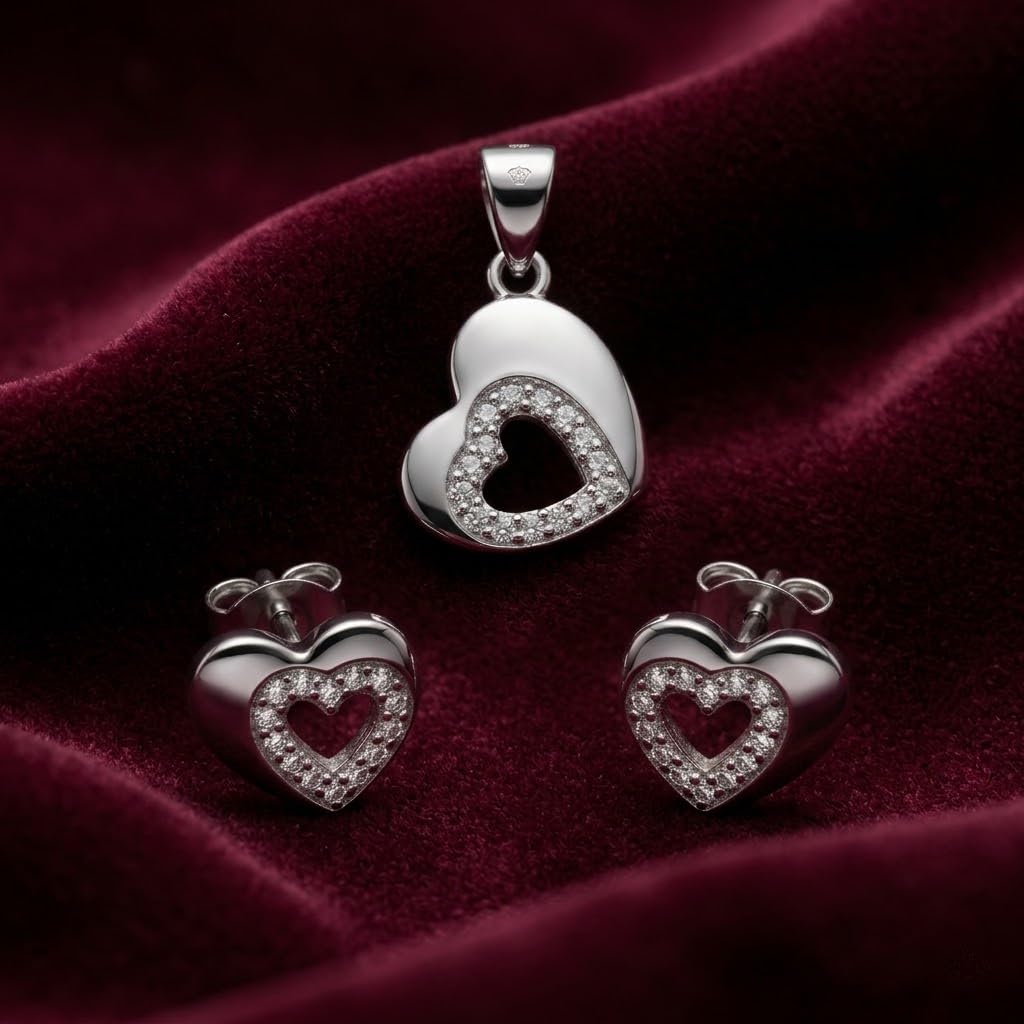 Open Heart 925 sterling silver pendant and stud earrings jewellery set with cubic zirconia by Silvme â€” angled studio view