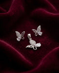 Silvme pure 925 sterling silver pink butterfly pendant and stud earrings set with pink cubic zirconia, side profile view