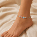 Close-up of a rhombus CZ frame around an evil-eye on the Silvme 925 sterling silver rhombus CZ evil eye anklet