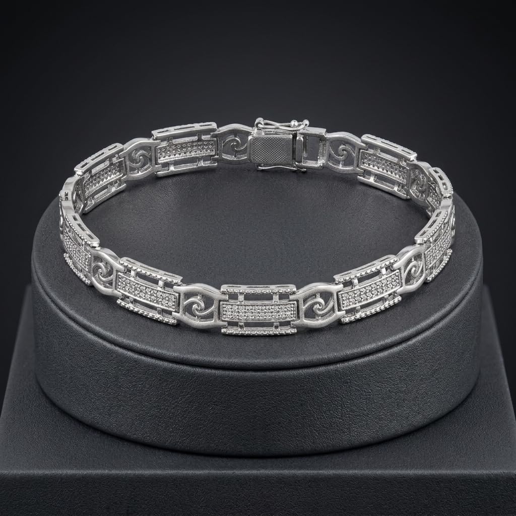 Full length of the slim textured link bracelet showing its polished silver-tone finish
