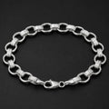 Close-up of round links that switch between a rope-cut texture and a clean polish on the Silvme rope-cut rolo chain bracelet
