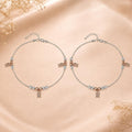 Charm, bead and chain detail on the Silvme rose-gold CZ bell charm 925 silver anklet payal