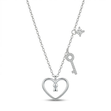 A silver necklace featuring a heart-shaped pendant with a keyhole in the center, a dangling key charm, and a small star-shaped accent, shown on a clean white background.
