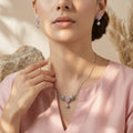 Silvme 925 silver geometric pink pendant necklace and stud earrings with pink cubic zirconia, pendant close-up