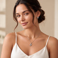 Initial D 925 sterling silver pendant necklace and stud earrings jewellery set with cubic zirconia by Silvme â€” styled product image