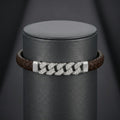 Full length of the braided cord bracelet with pave bar showing its brown cord with silver-tone fittings finish
