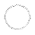 Full length of the heavy curb chain bracelet showing its polished silver-tone finish