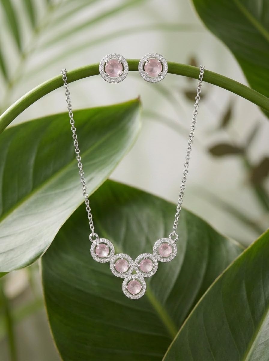 Silvme pure 925 sterling silver pink cluster pendant necklace and stud earrings set with pink cubic zirconia, detail sparkle close-up