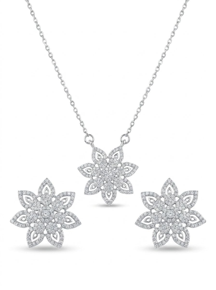 Floral Flower 925 sterling silver pendant necklace and stud earrings jewellery set with cubic zirconia by Silvme â€” styled view