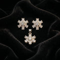 Silvme 925 silver snowflake pendant and stud earrings with cubic zirconia, close-up detail