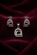 Minimalist Arch 925 sterling silver pendant and stud earrings jewellery set by Silvme â€” angled studio view