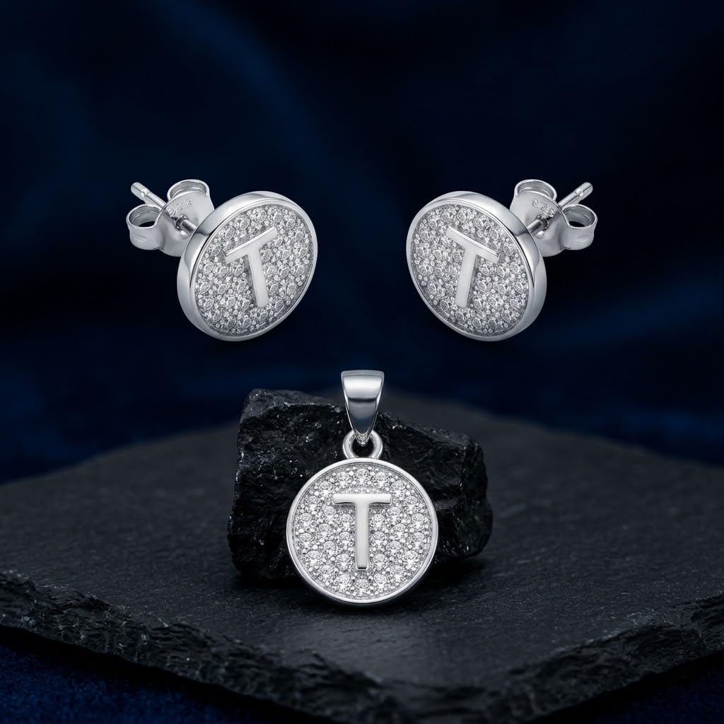 Silvme 925 silver initial t pendant necklace and stud earrings with cubic zirconia, close-up detail