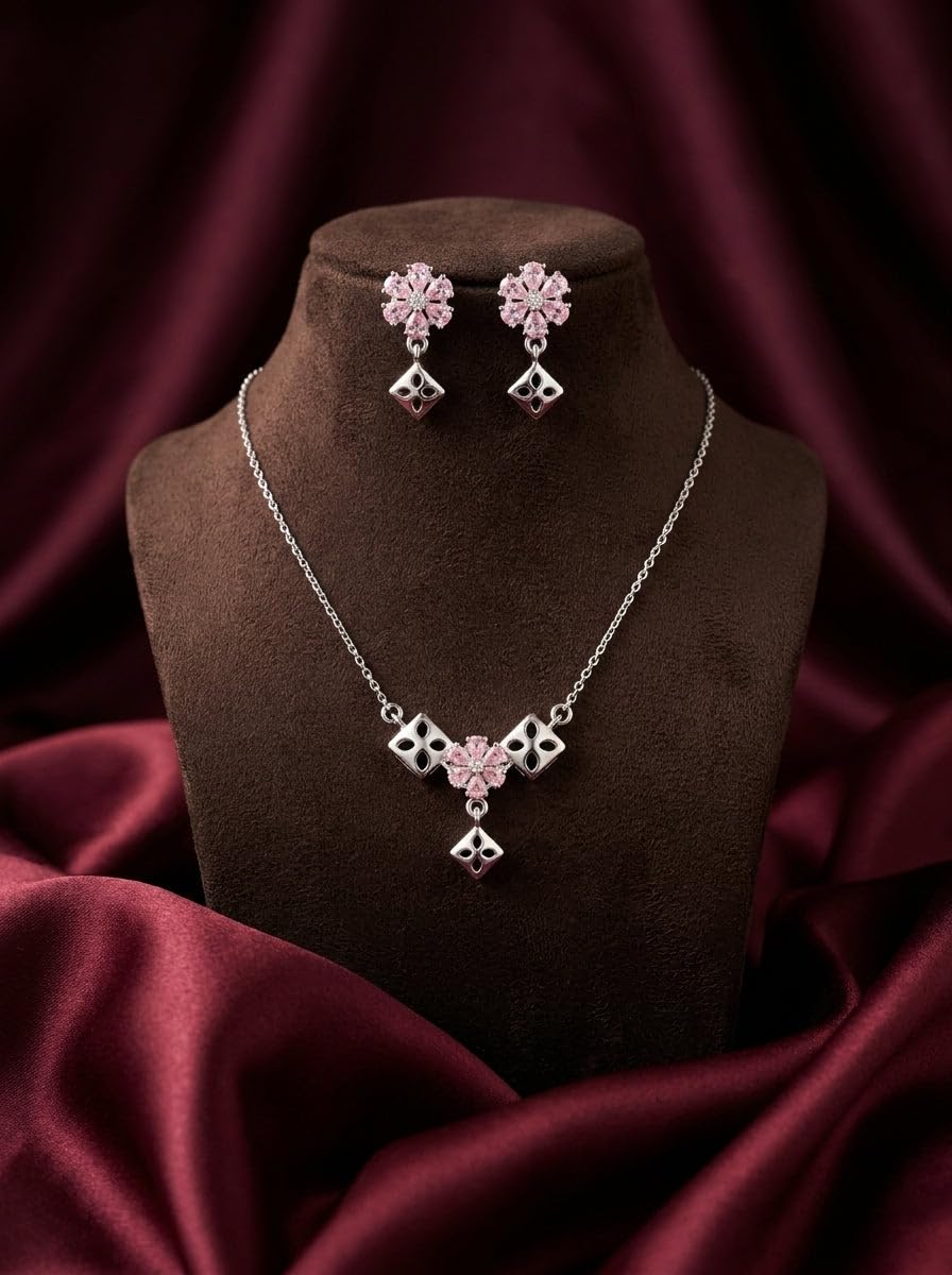 Silvme pure 925 sterling silver geometric pink pendant necklace and stud earrings set with pink cubic zirconia, detail sparkle close-up
