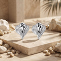 Black Swirl Leaf 925 silver stud earrings for women, gift for sister, further studio view