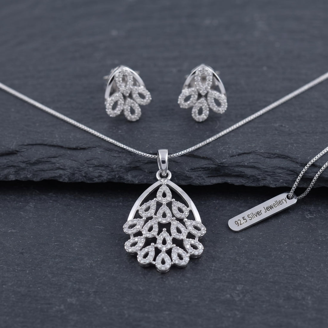 Silvme 925 silver sparkling cubic zirconia pendant and stud earrings with cubic zirconia, model styling view