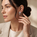 Bow & Star 925 silver stud earrings for women, everyday wear, overhead view
