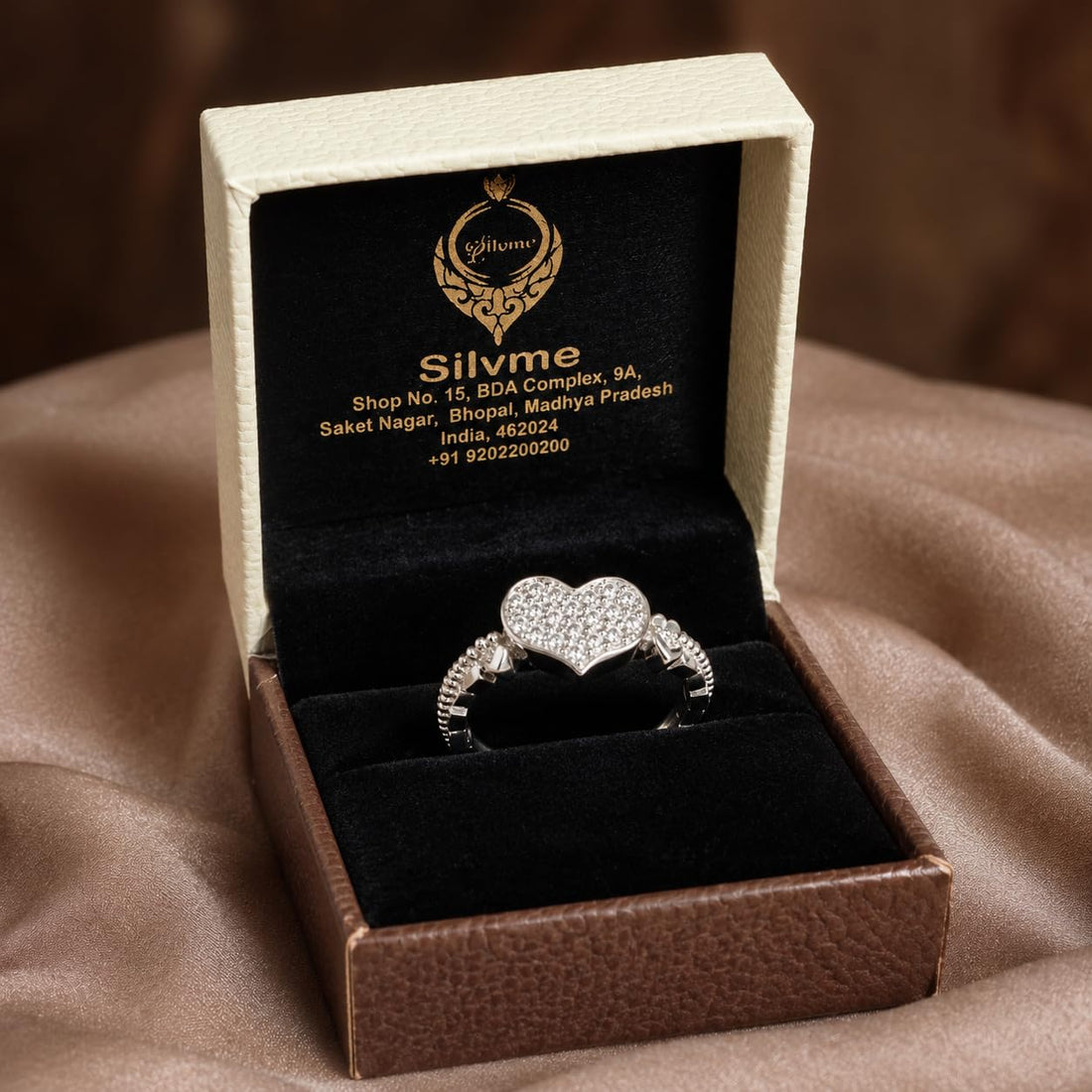 Silvme Pavé Heart Cluster 925 sterling silver ring for women set with cubic zirconia — front view on white background