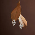 Curved PavÃ© Stone-Set Stud Earrings, close-up detail
