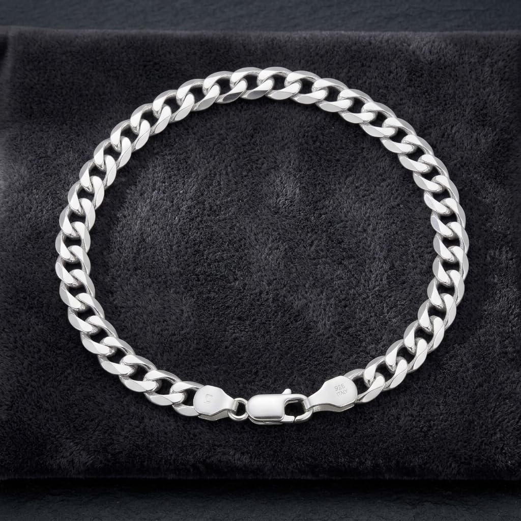 The polished curb chain bracelet for men shown against a plain studio background
