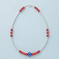 Silvme red bead evil eye 925 silver anklet with red beads and a blue evil-eye charm, full-length view