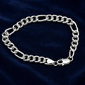 Lobster clasp and end links on the Silvme polished figaro chain bracelet