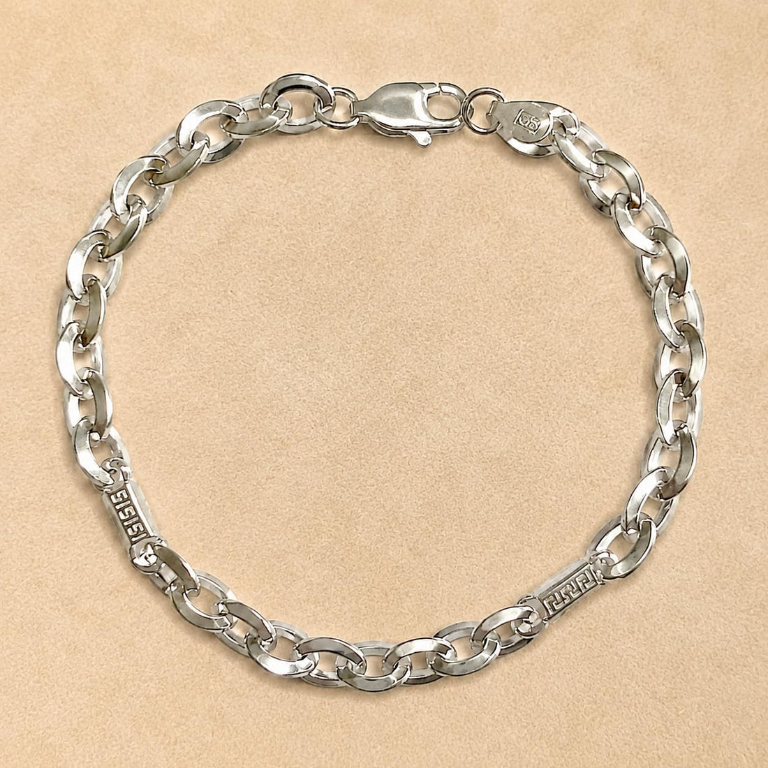 Silvme 925 sterling silver greek key mariner bracelet for men shaped into an oval on a white background