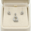 Silvme 925 silver minimalist arch pendant and stud earrings, lifestyle gift image