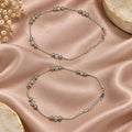 Silvme 925 sterling silver Cream Tube & Black Bead Evil Eye anklet, worn on the ankle