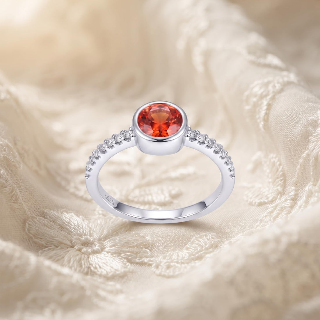 Silvme Orange-Red Bezel Solitaire 925 sterling silver ring for women set with cubic zirconia — front view on white background