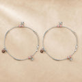 Close-up of pink beads and rose-gold floral CZ charms on the Silvme 925 sterling silver pink bead & rose-gold floral anklet