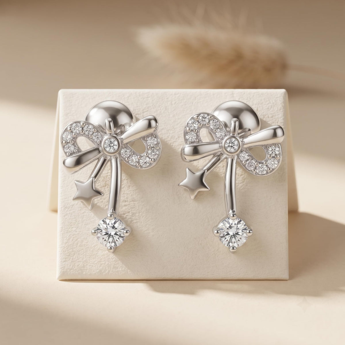 Bow & Star 925 silver stud earrings for women, office wear, side angle view