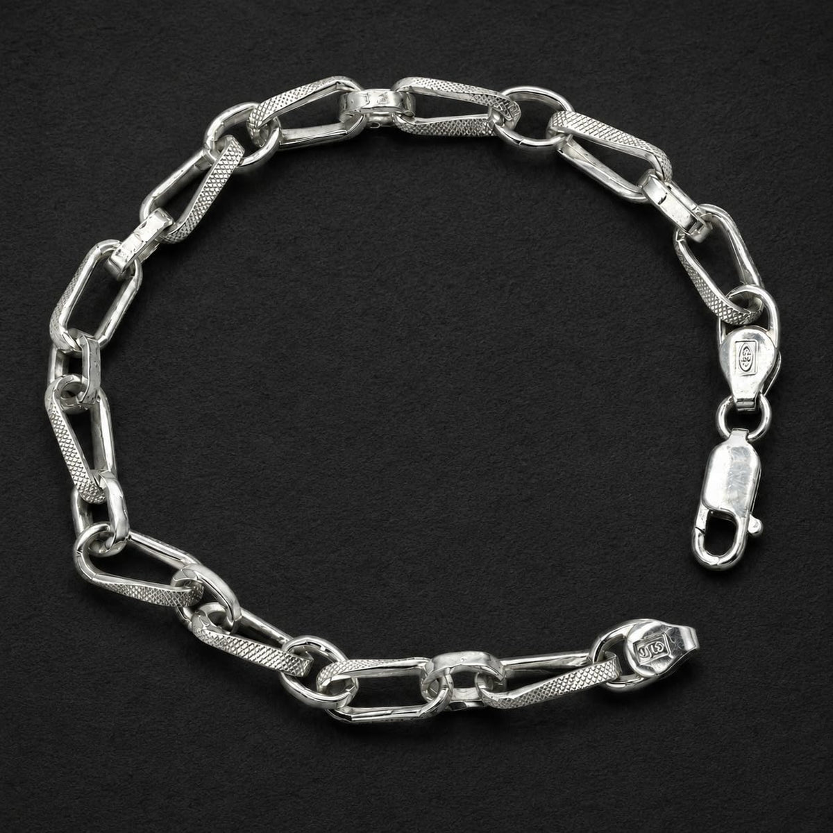 Lobster clasp and end links on the Silvme textured paperclip link bracelet