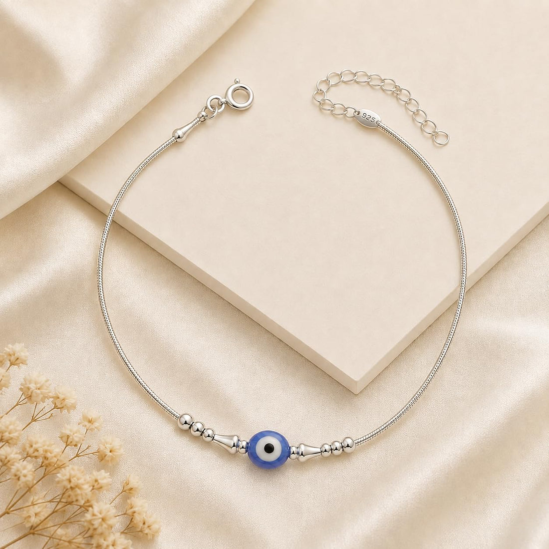 Silvme 925 sterling silver single evil eye anklet with a single blue evil-eye bead, white background full view