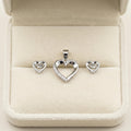 Silvme 925 silver dainty heart pendant and stud earrings with cubic zirconia, styled lifestyle image