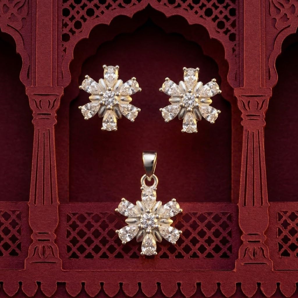 Snowflake 925 sterling silver pendant and stud earrings jewellery set with cubic zirconia by Silvme â€” angled studio view