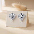 Black Swirl Leaf 925 silver stud earrings for women, office wear, side angle view